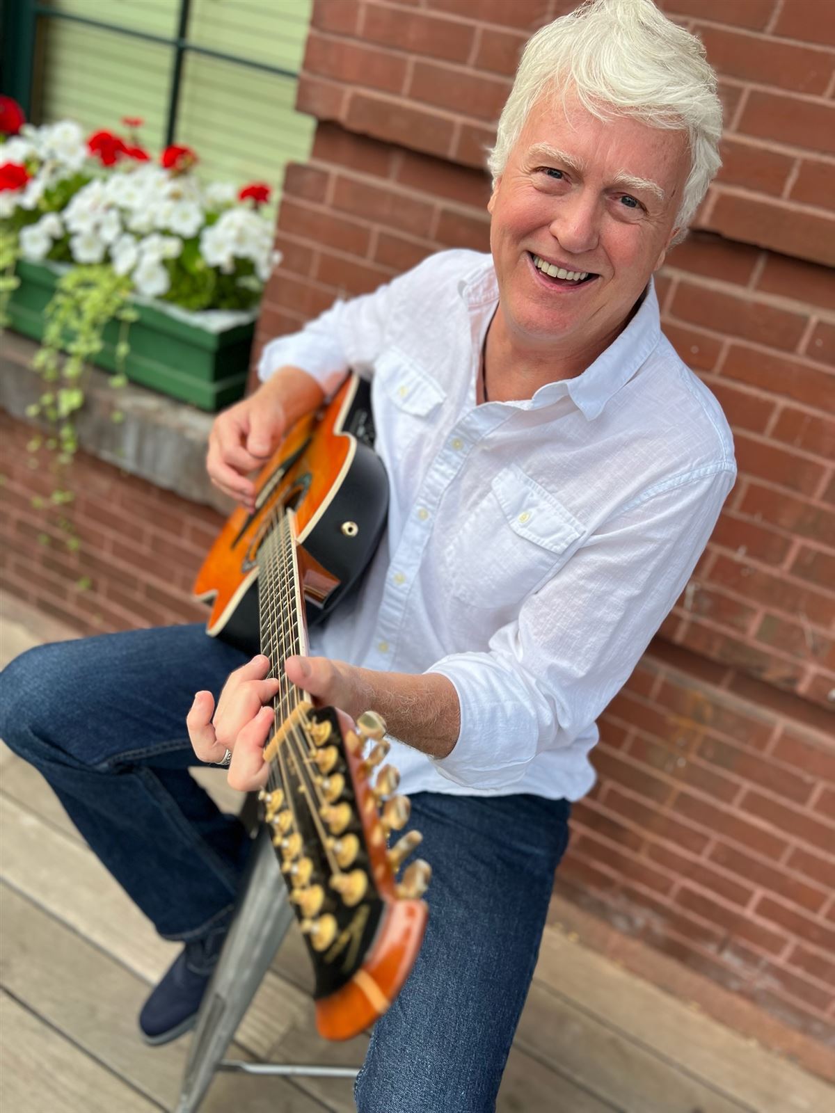 Phil Calkins with his 12-string guitar